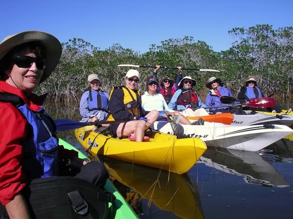 women kayaking tour group